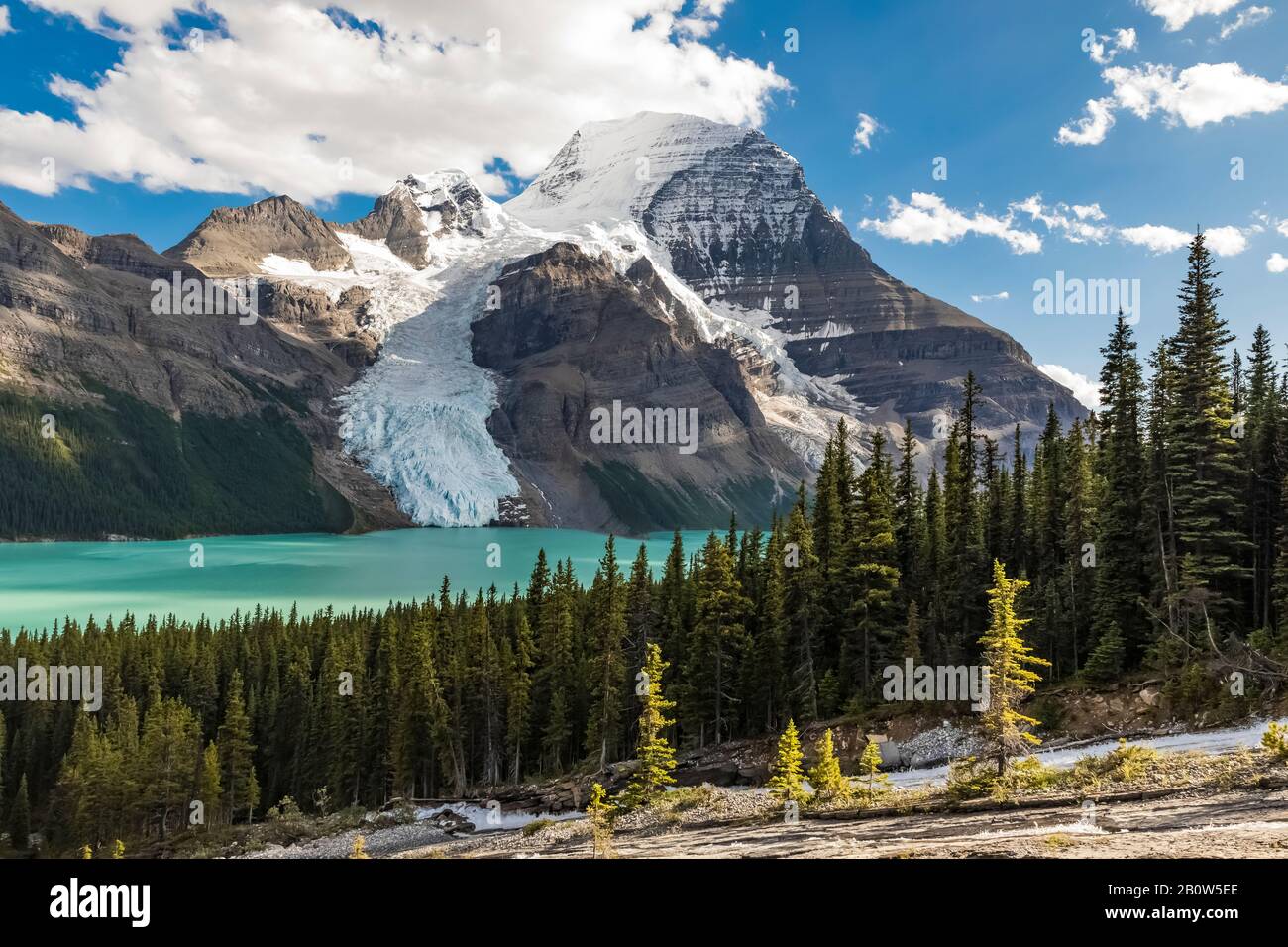 Toboggan Falls, a cascade carving the limestone bedrock, with Mount
