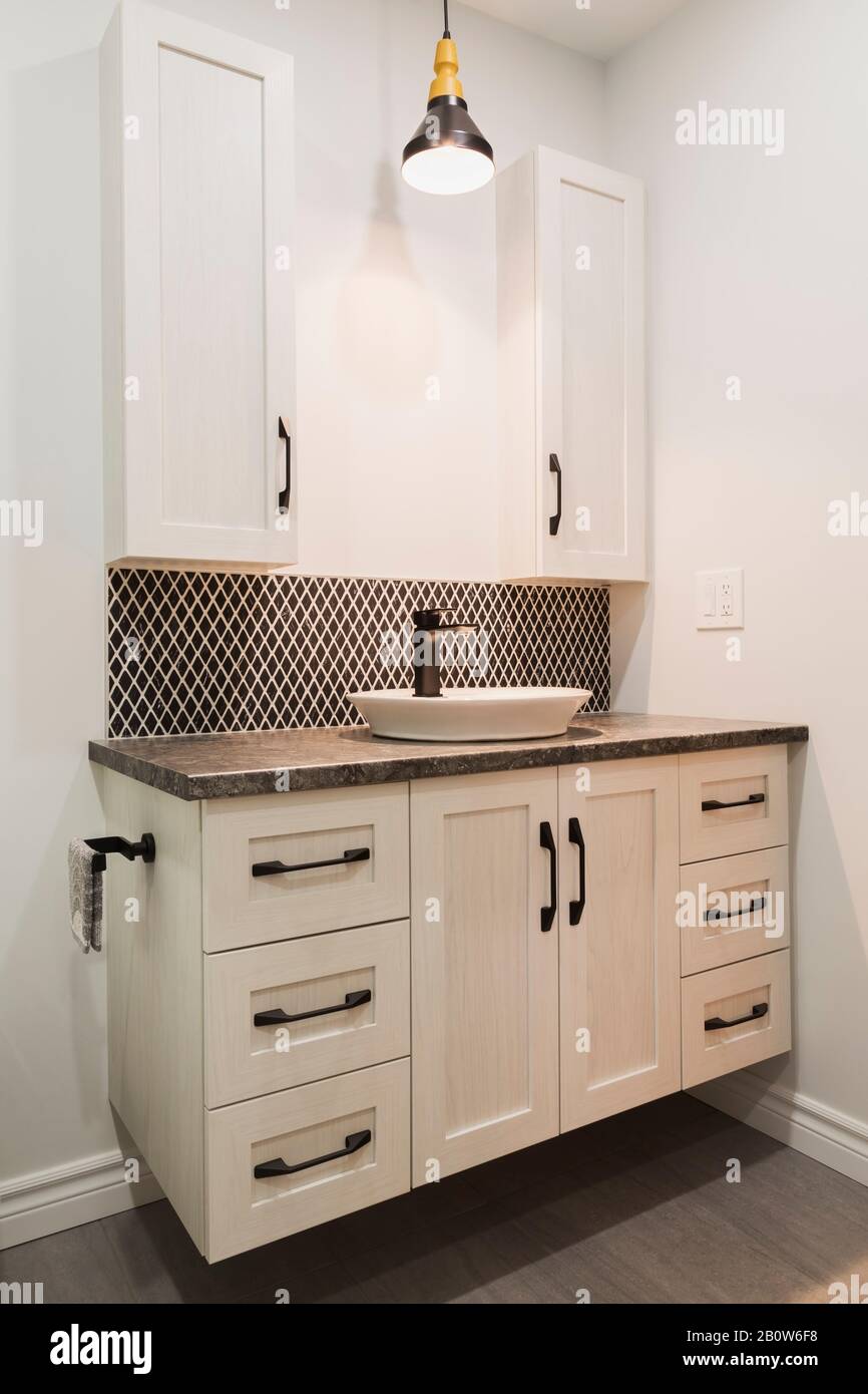 Antique finish wooden with black nuanced laminated countertop