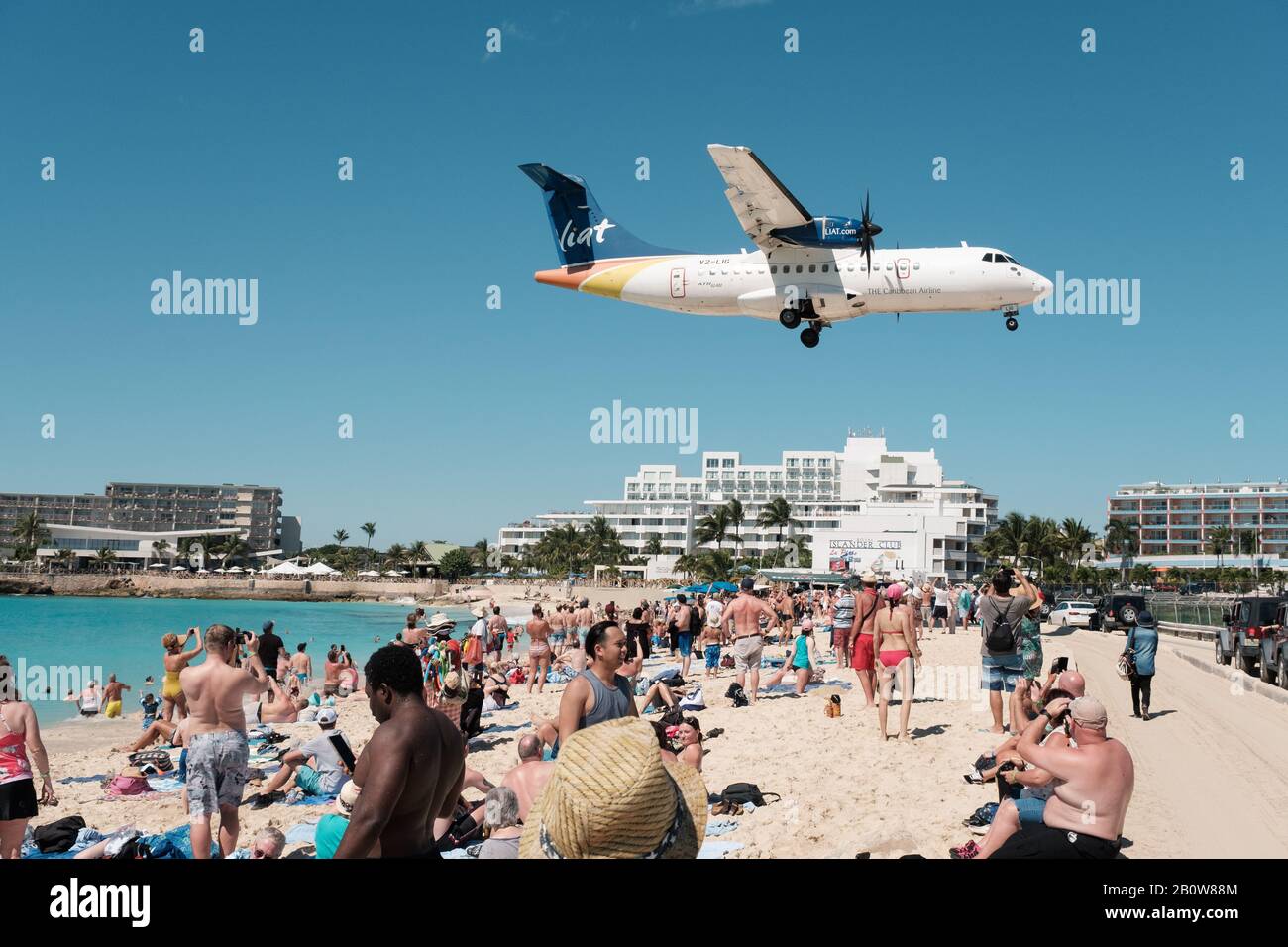 Liat Airlines Plane comining into Land, over Maho Beach, St Maartens, Caribbean, Stock Photo