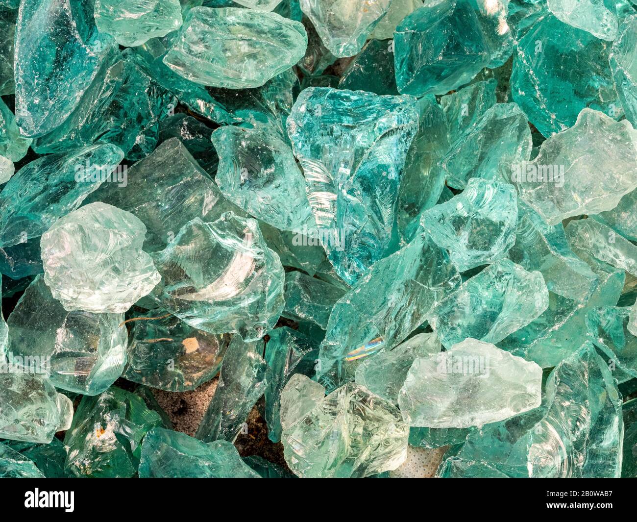 Close up of green broken glass filling frame Stock Photo