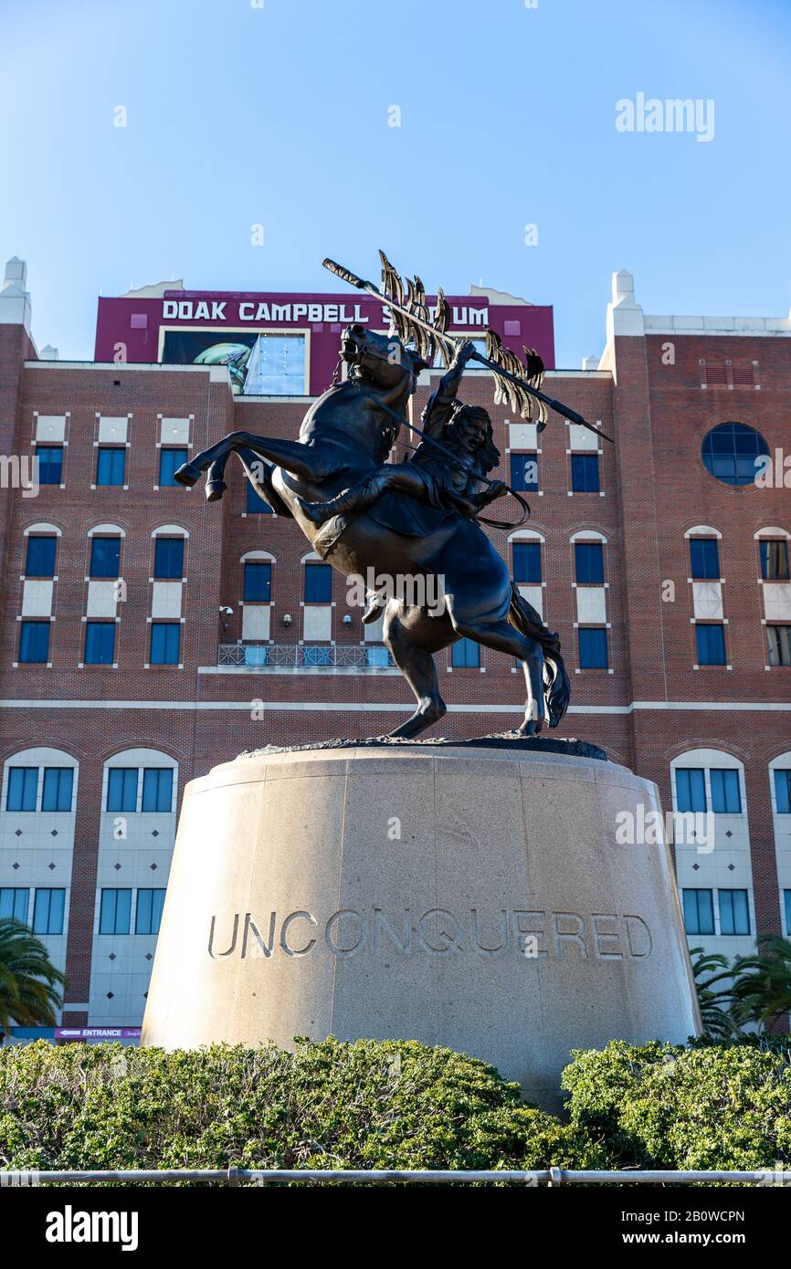 Tallahassee, FL / USA - February 15, 2020: Unconquered Statue in front of the Doak Campbell Stadium, home of Florida State University Football Stock Photo