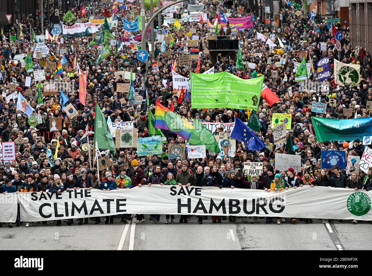 GERMANY, Hamburg city, Fridays for future movement, Save the Climate rally with 30.000 protesters for climate protection, in first row, above the R in Hamburg: swedish activist Greta Thunberg with her banner skolstrejk för klimatet, / DEUTSCHLAND, Hamburg, Fridays-for future Bewegung, Demo fuer Klimaschutz, erste Reihe über dem R im Wort Hamburg: Greta Thunberg mit ihrem Plakat skolstrejk för klimatet, 21.2.2020 Stock Photo
