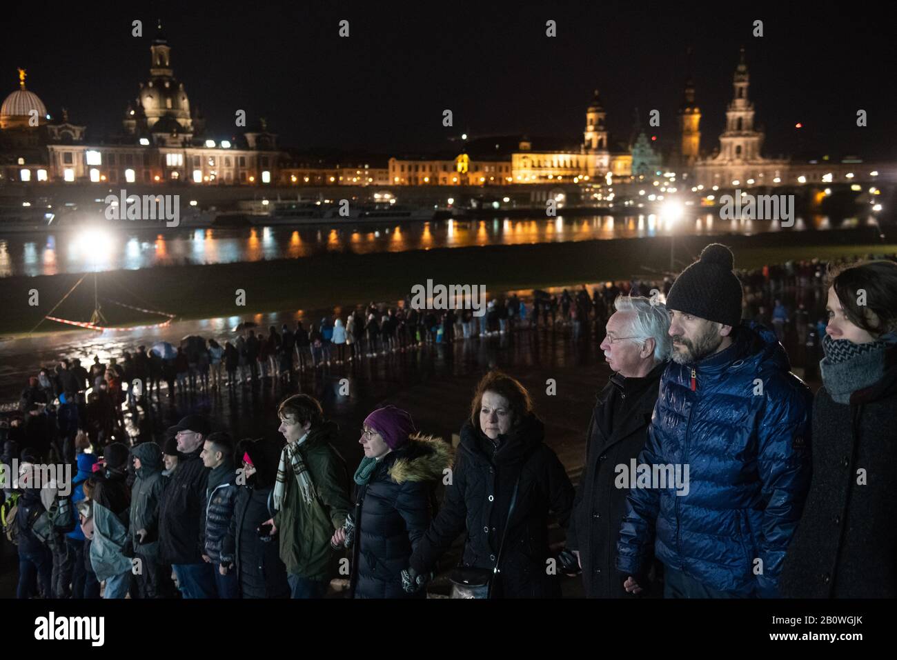 Dresden,Germany. 13th February 2020. Dignitaries and residents of the Saxony capital of Dresden join hands to form a human chain in commemoration Stock Photo