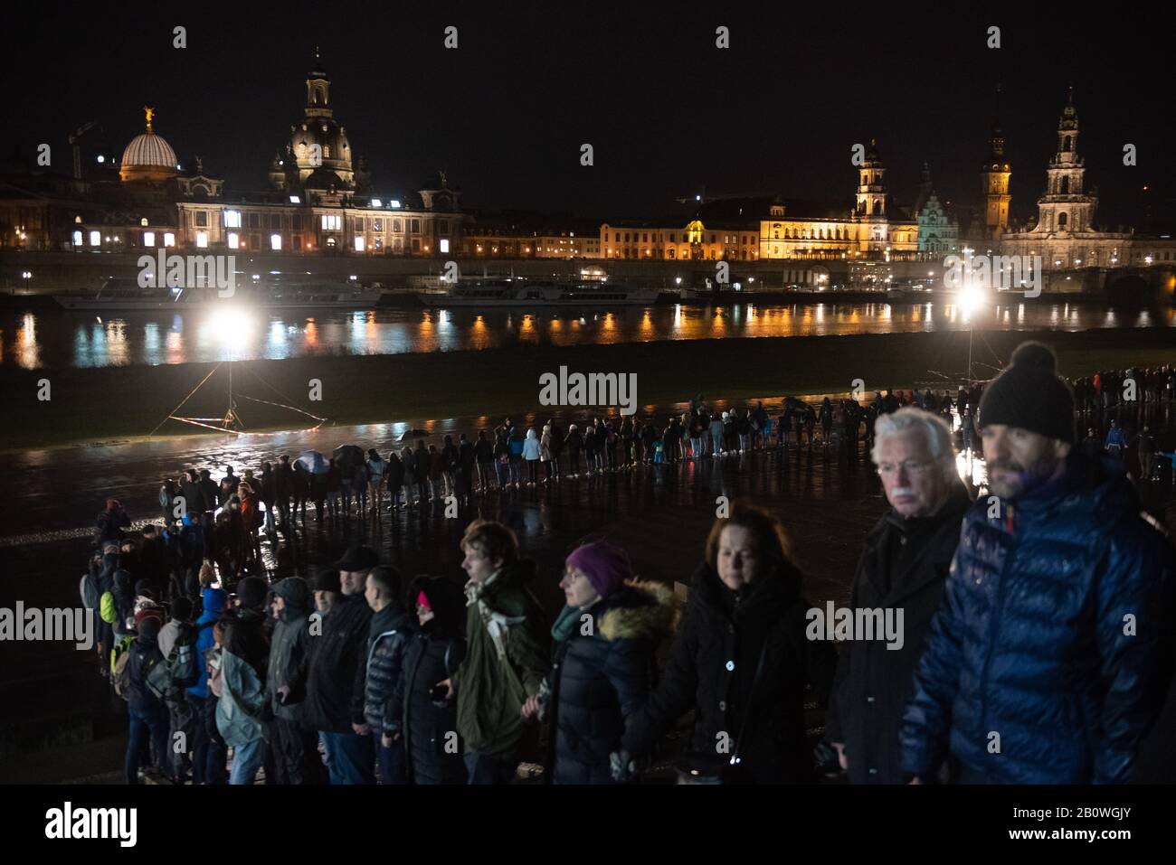 Dresden,Germany. 13th February 2020. Dignitaries and residents of the Saxony capital of Dresden join hands to form a human chain in commemoration Stock Photo