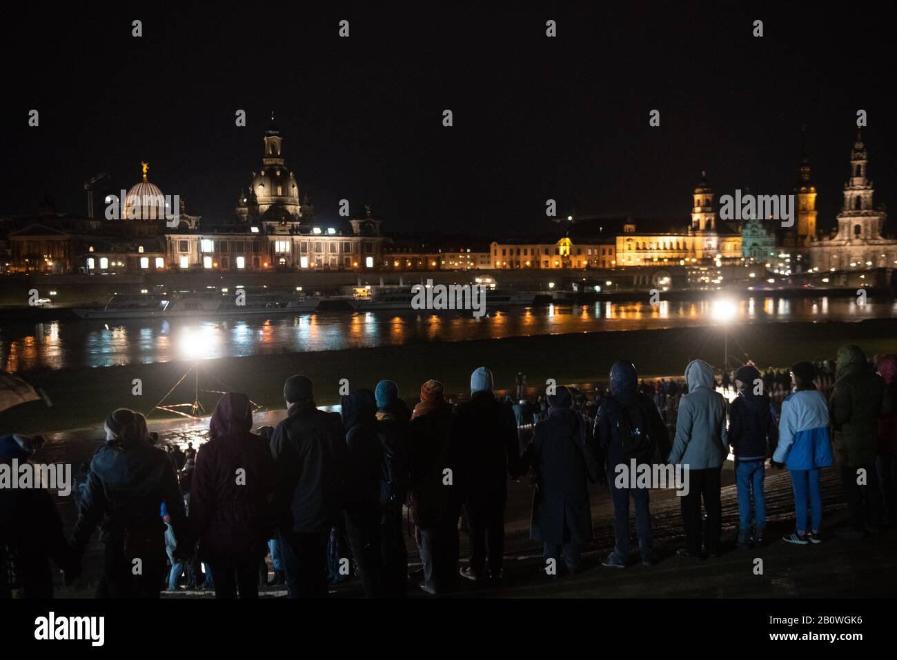 Dresden,Germany. 13th February 2020. Dignitaries and residents of the Saxony capital of Dresden join hands to form a human chain in commemoration Stock Photo