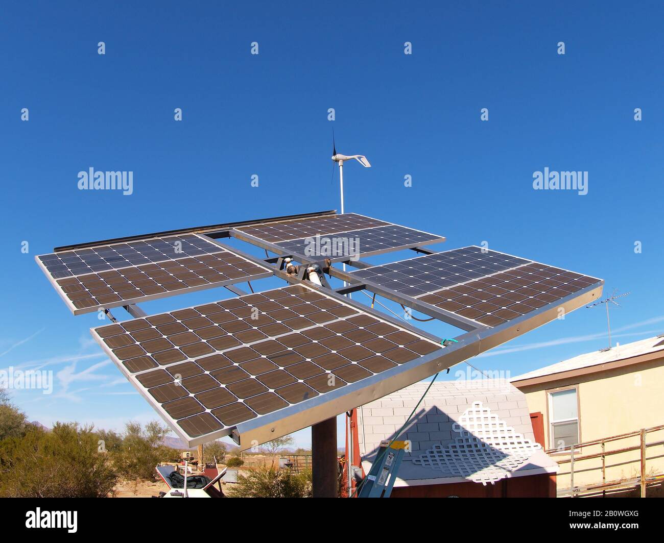 A solar module array and wind generator gathering energy for an Arizona ...