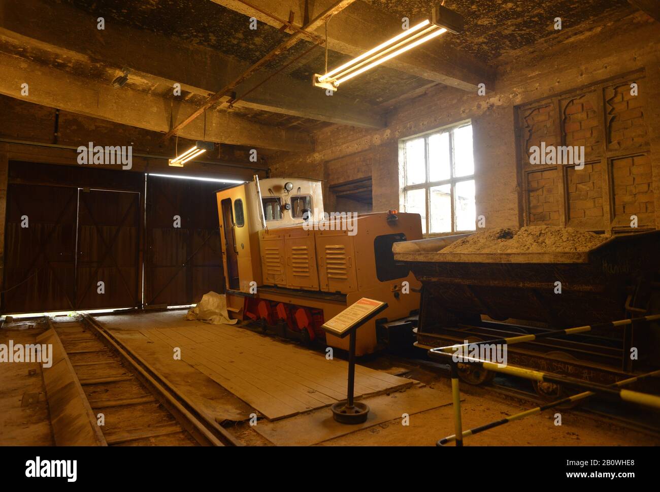Mildenberg, Germany 08-16-2019 brickwork industry museum view inside a industry barack with an old train Stock Photo