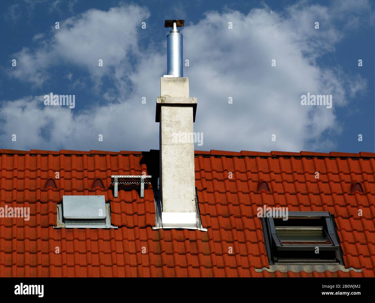 modern brown stucco chimneys with white ceramic cap stone, bright brown