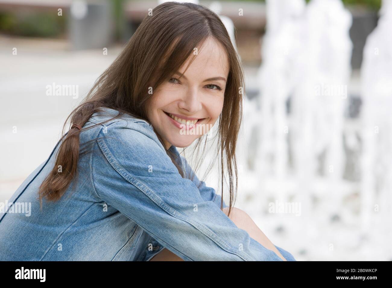 Portrait of a woman wearing a denim jacket Stock Photo