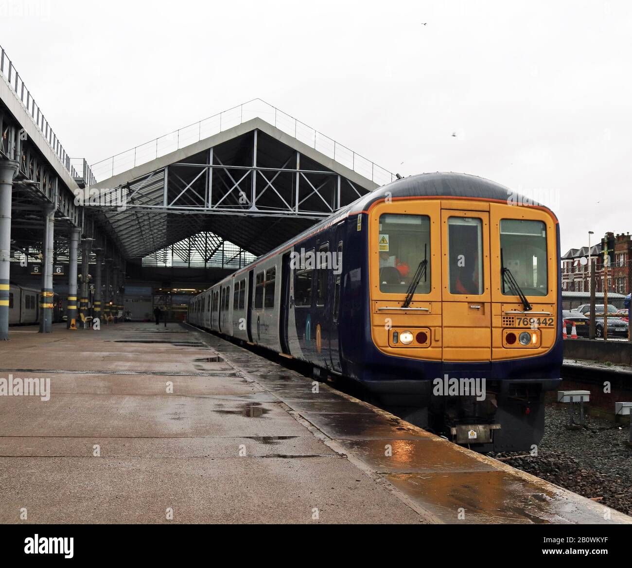One of Northern’s “new” bi-mode trains stands in the rain at Southport during a test run from Southport to Wigan on 15.2.2020. Unit no 769 442. Stock Photo