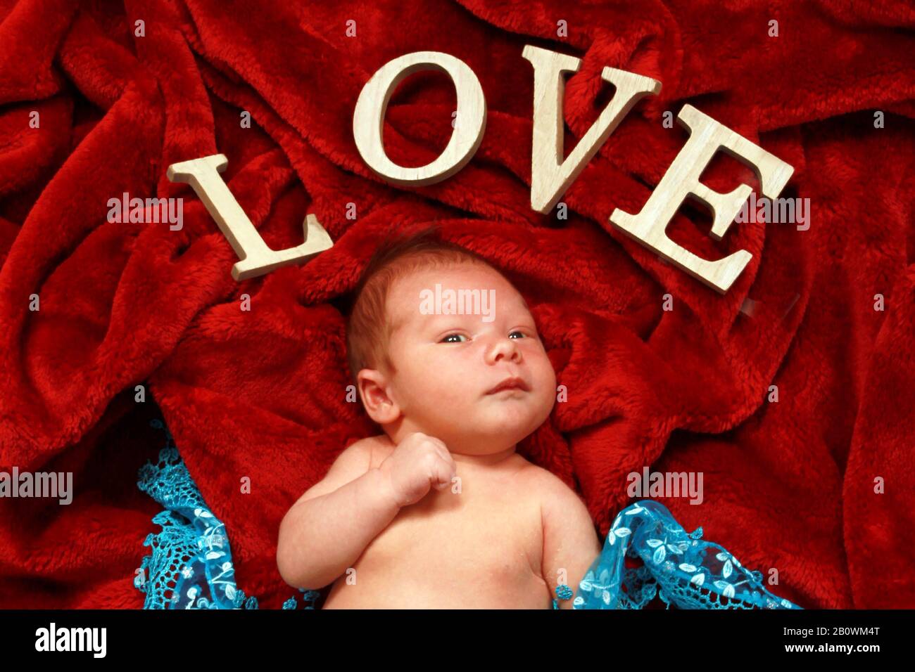 Beautiful Baby Boy With The Words LOVE Stock Photo Alamy
