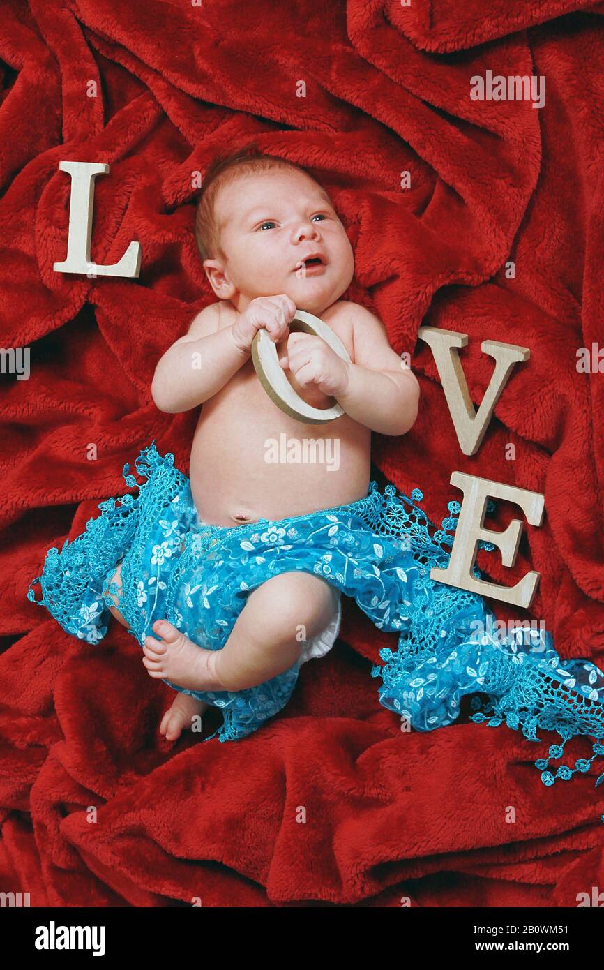 Beautiful Baby Boy With The Words LOVE Stock Photo Alamy