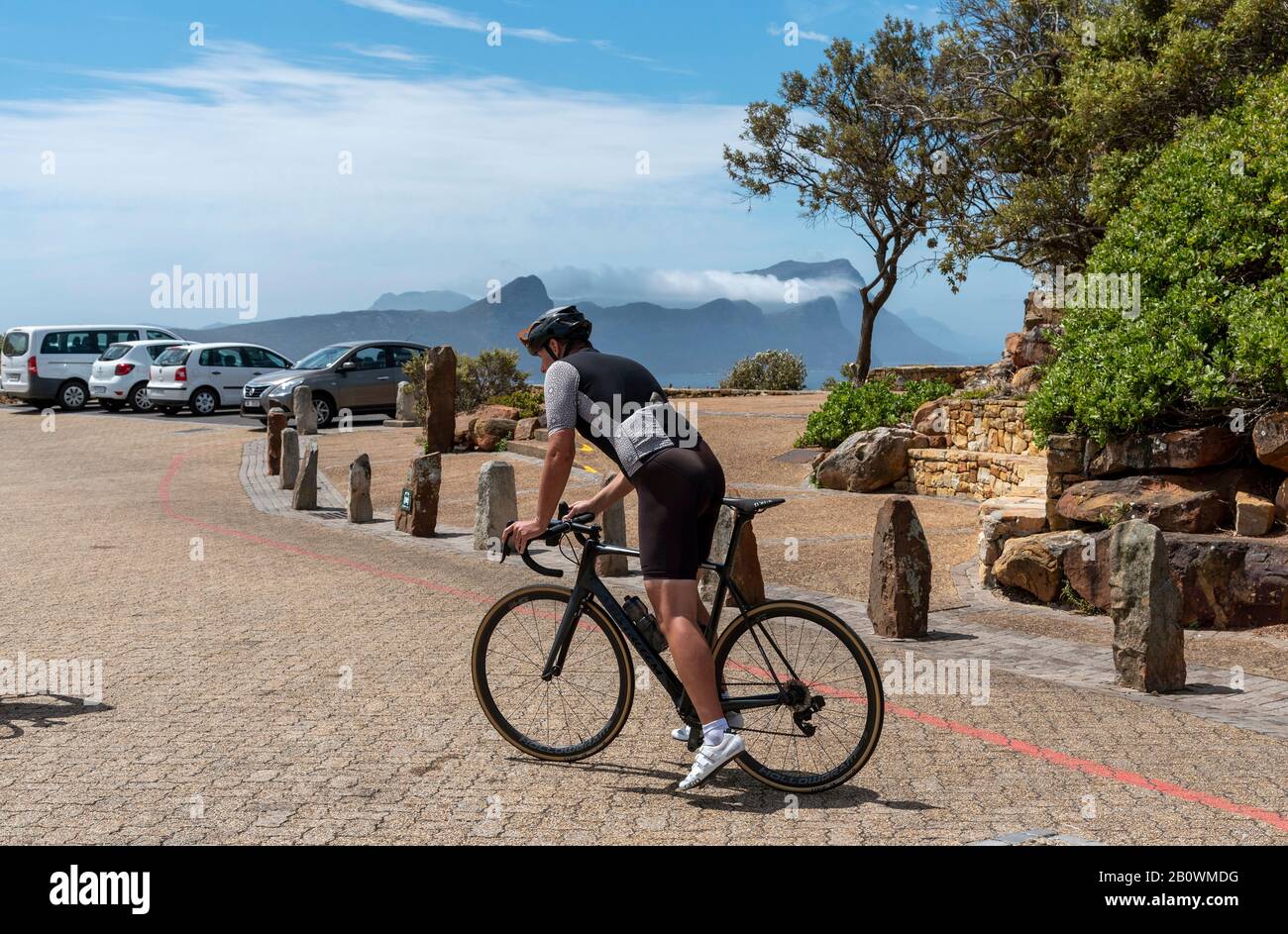 Cape Point, Table Mountain National Park, South Africa. Dec 2019.  Cyclist set off from the Cape Point parking area on a cycle ride through the Table Stock Photo