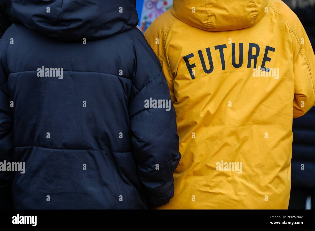 Details of the jackets of two teens, of which one of them reads “Future” Stock Photo