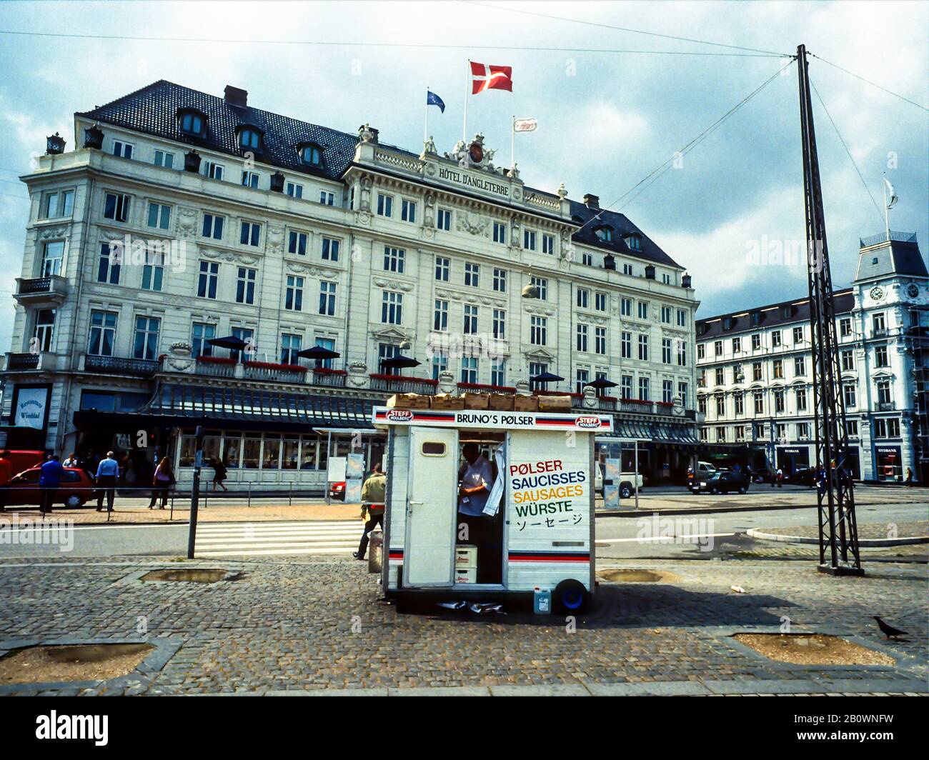Sausage cart on Kongens Nytorf in front of Hotel d'Angleterre, Copenhagen, Denmark. Stock Photo