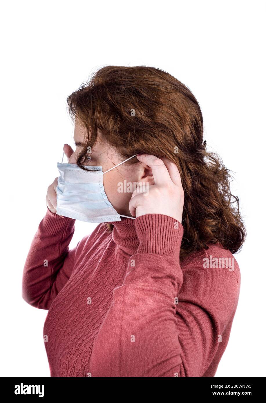 White girl puts on mask hi-res stock photography and images - Alamy