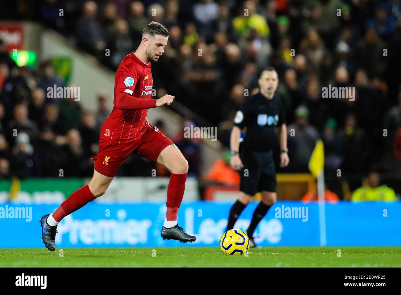 15th February 2020, Carrow Road, Norwich, England; Premier League, Norwich City v Liverpool : Jordan Henderson (14) of Liverpool with the ball Stock Photo
