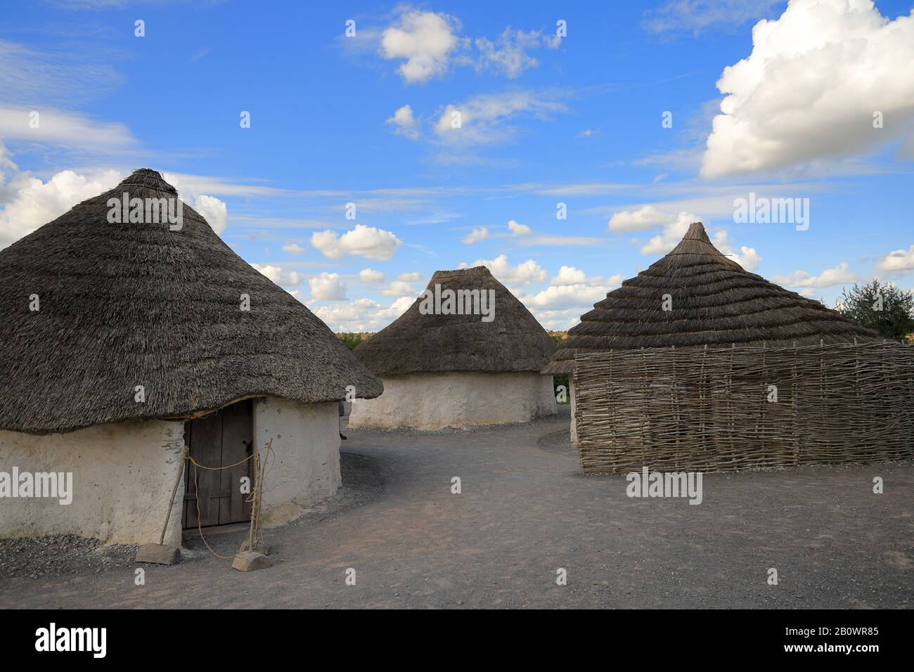 Reconstructed roundhouses at Stonehenge Stock Photo
