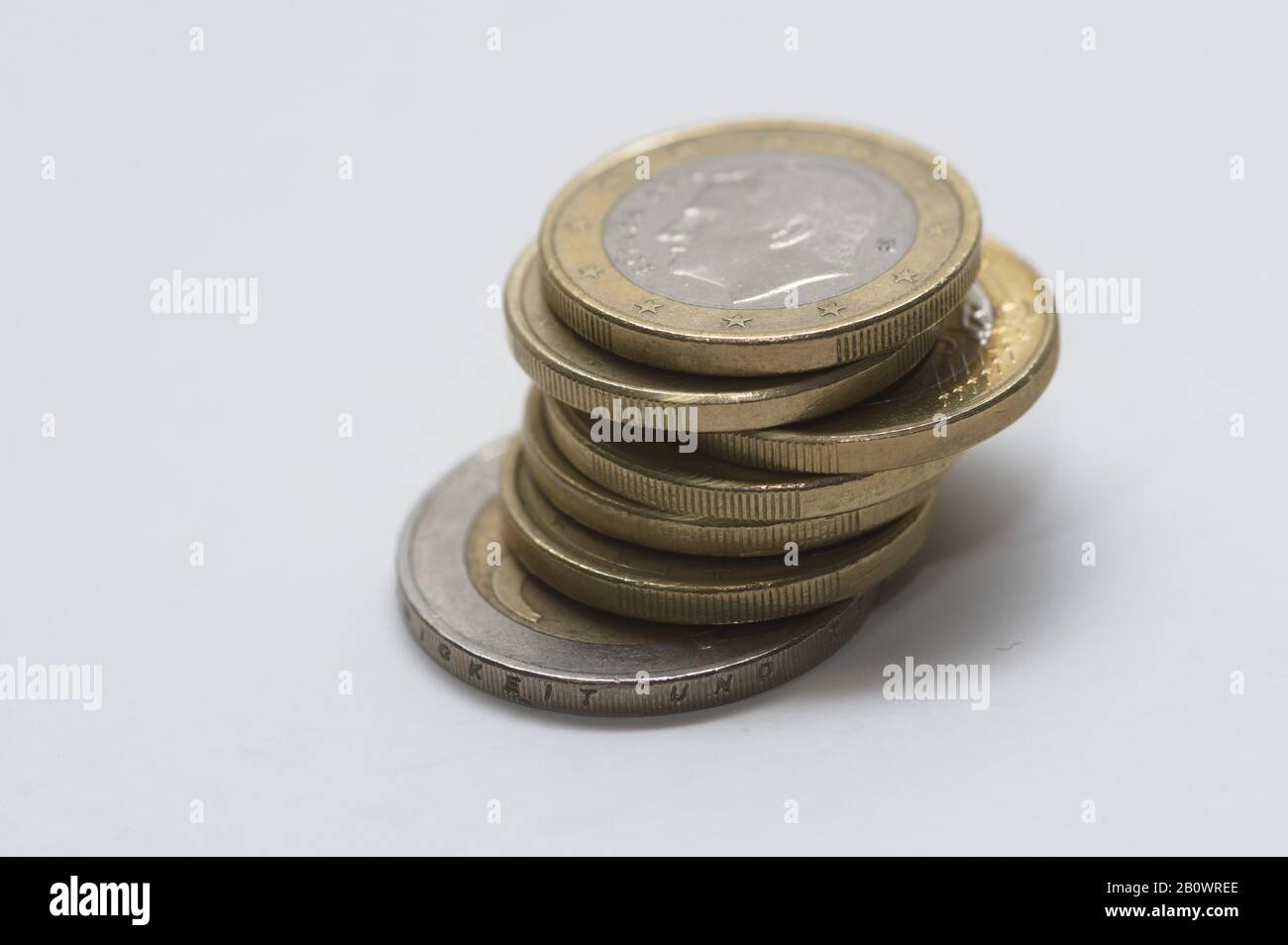 A stack of gold and silver Euro coins Stock Photo - Alamy