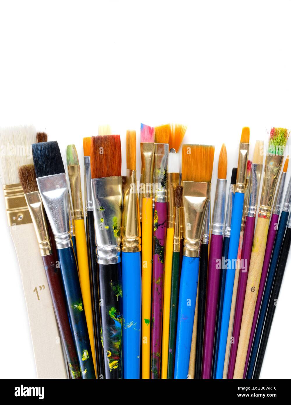 Assorted used paint brushes hi-res stock photography and images