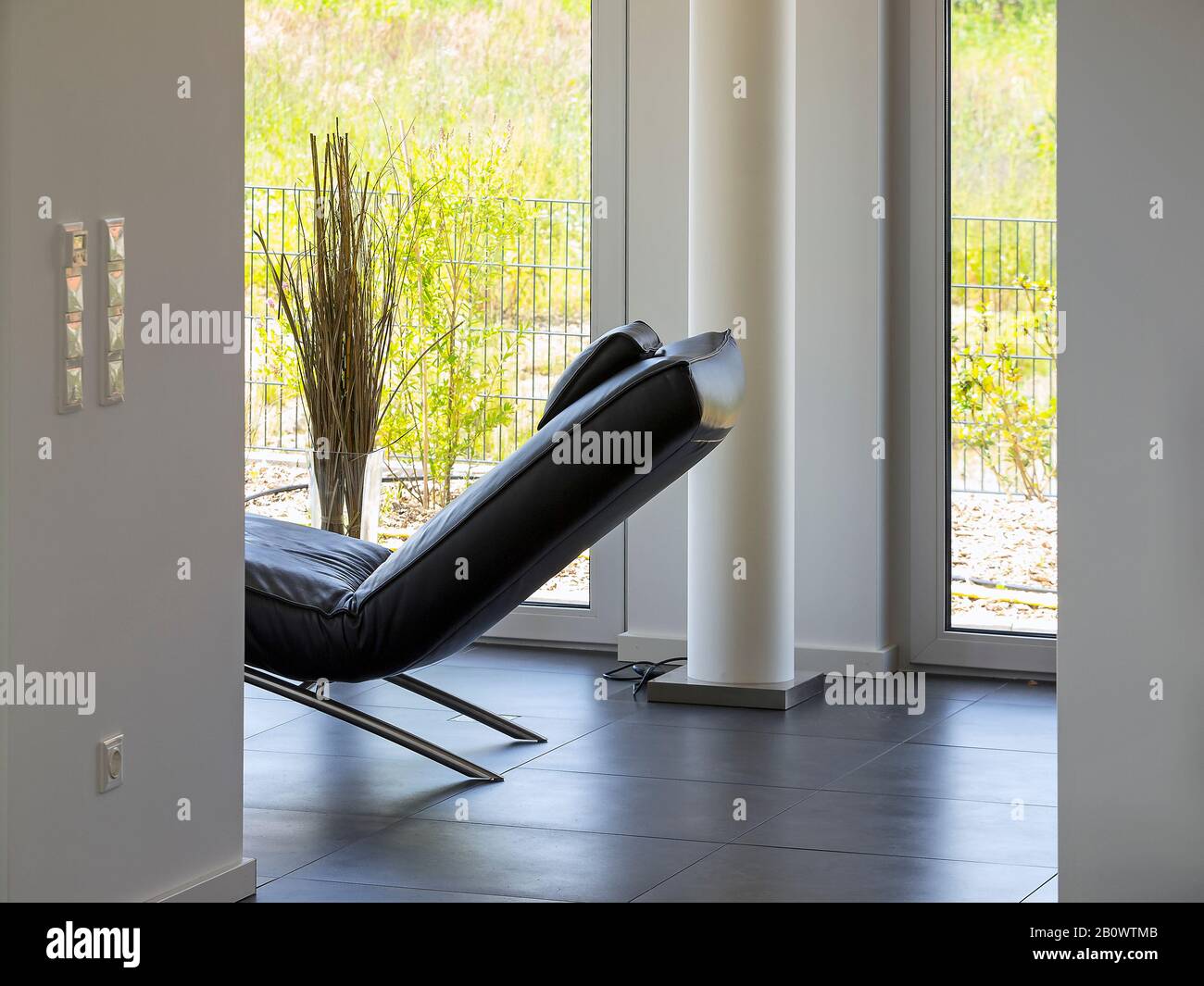 Apartment with armchair Stock Photo Alamy