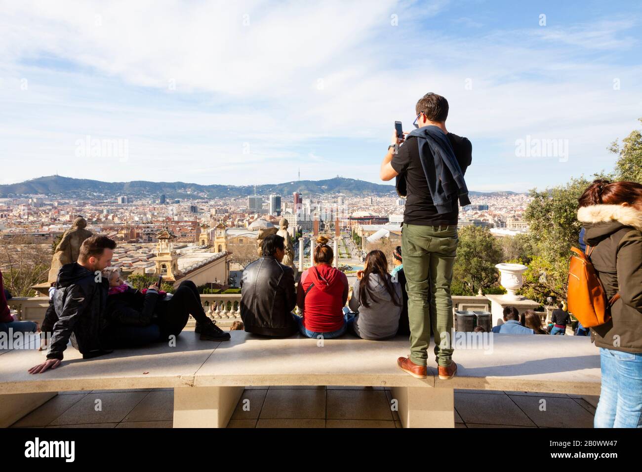 Tourists on the steps of the Museu Nacional d’Art looking over the city of Barcelona, Catalunya, Spain Stock Photo