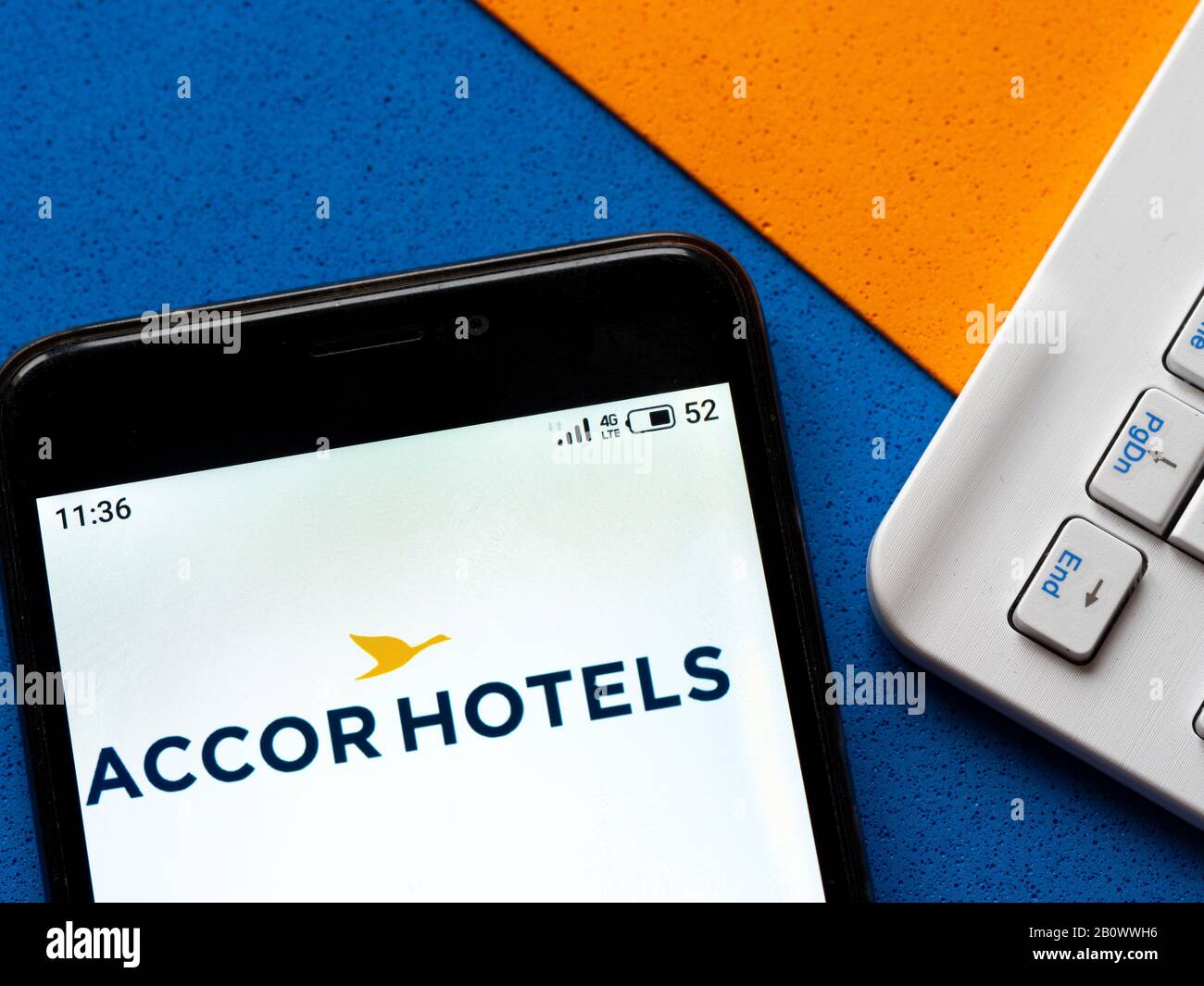 In this photo illustration an Accor Hotels logo seen displayed on a smartphone. Stock Photo