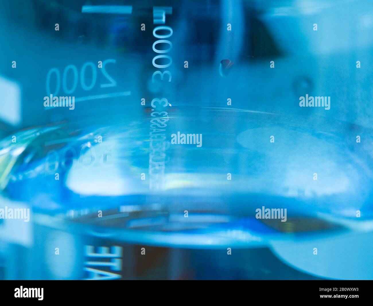 Measuring bottles in the laboratory Stock Photo - Alamy