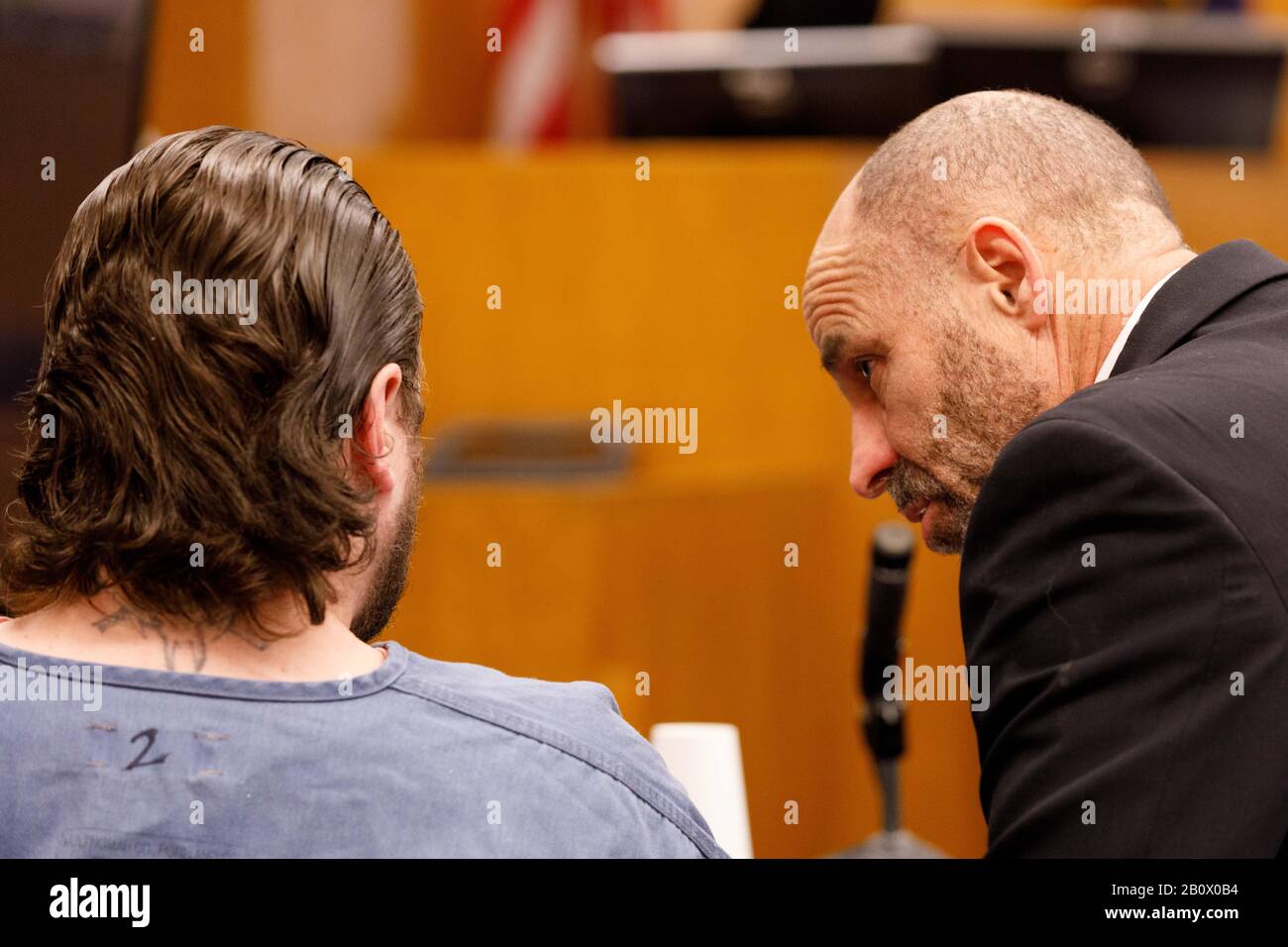 Defense attorney Dean Smith speaks with his client. The Jeremy Christian jury requested further instructions during its deliberations on February 21, 2020 in Portland, Oregon; and Judge Albrecht discusses with state and defense attorneys the proposed content. Christian is accused of stabbing to death two men, and grievously wounding a third, in a racially-motivated attack on a Max train in Portland, Oregon in May, 2017.   (Photo by John Rudoff/Sipa USA) Stock Photo