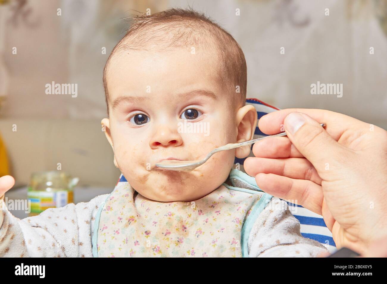 baby eating porridge
