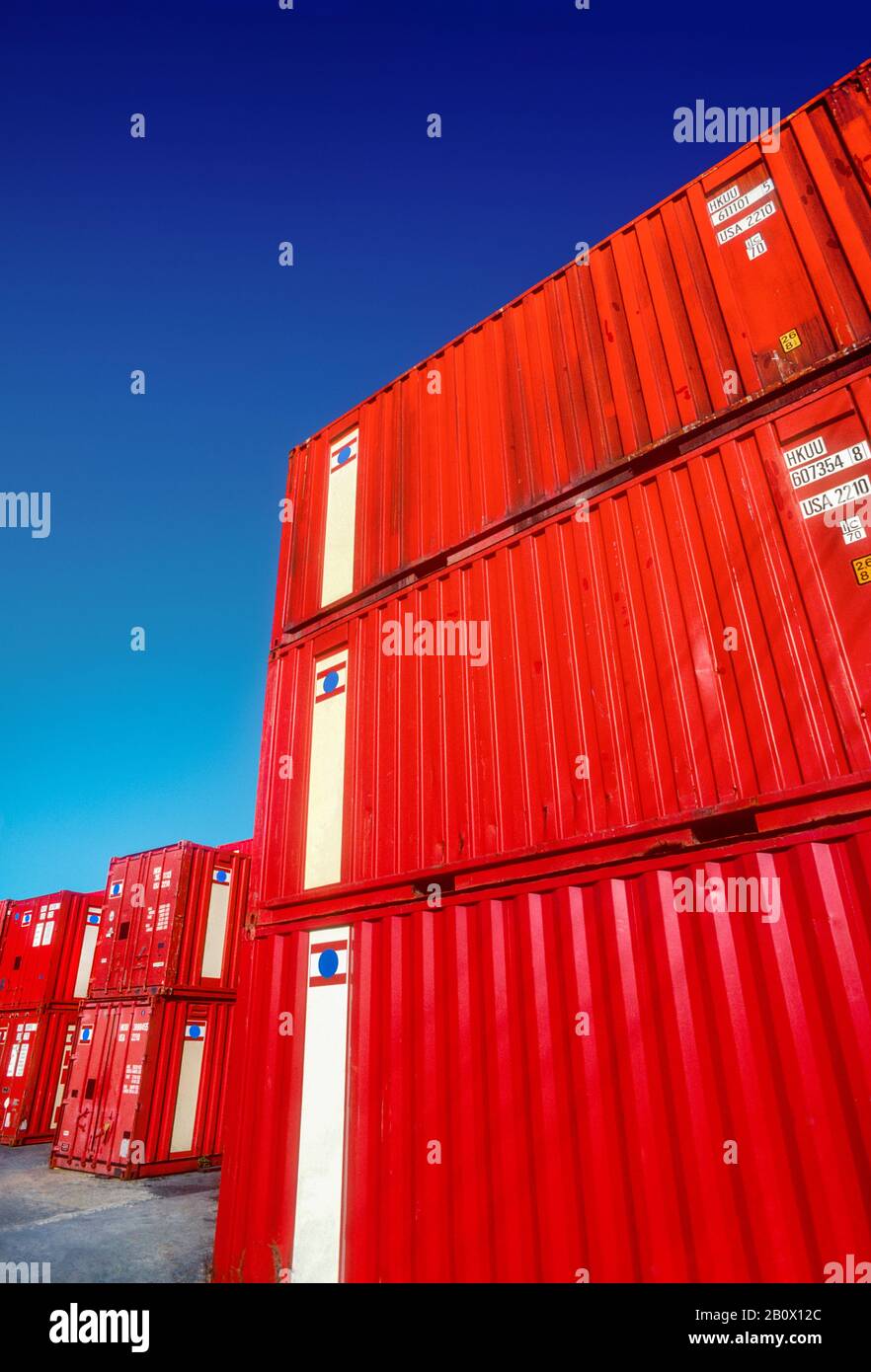 Bright red graphic shapes of containers stacked ready for shipping, Pyrmont, Sydney, New South Wales, Australia Stock Photo