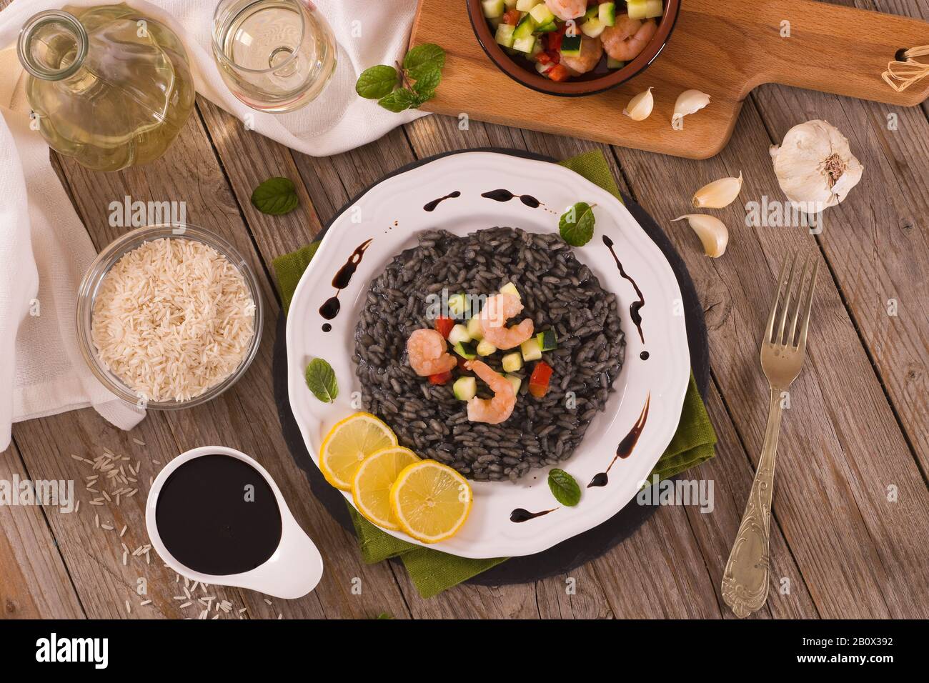 Squid ink risotto Stock Photo - Alamy