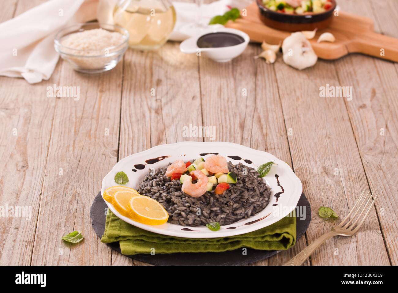 Squid ink risotto Stock Photo - Alamy