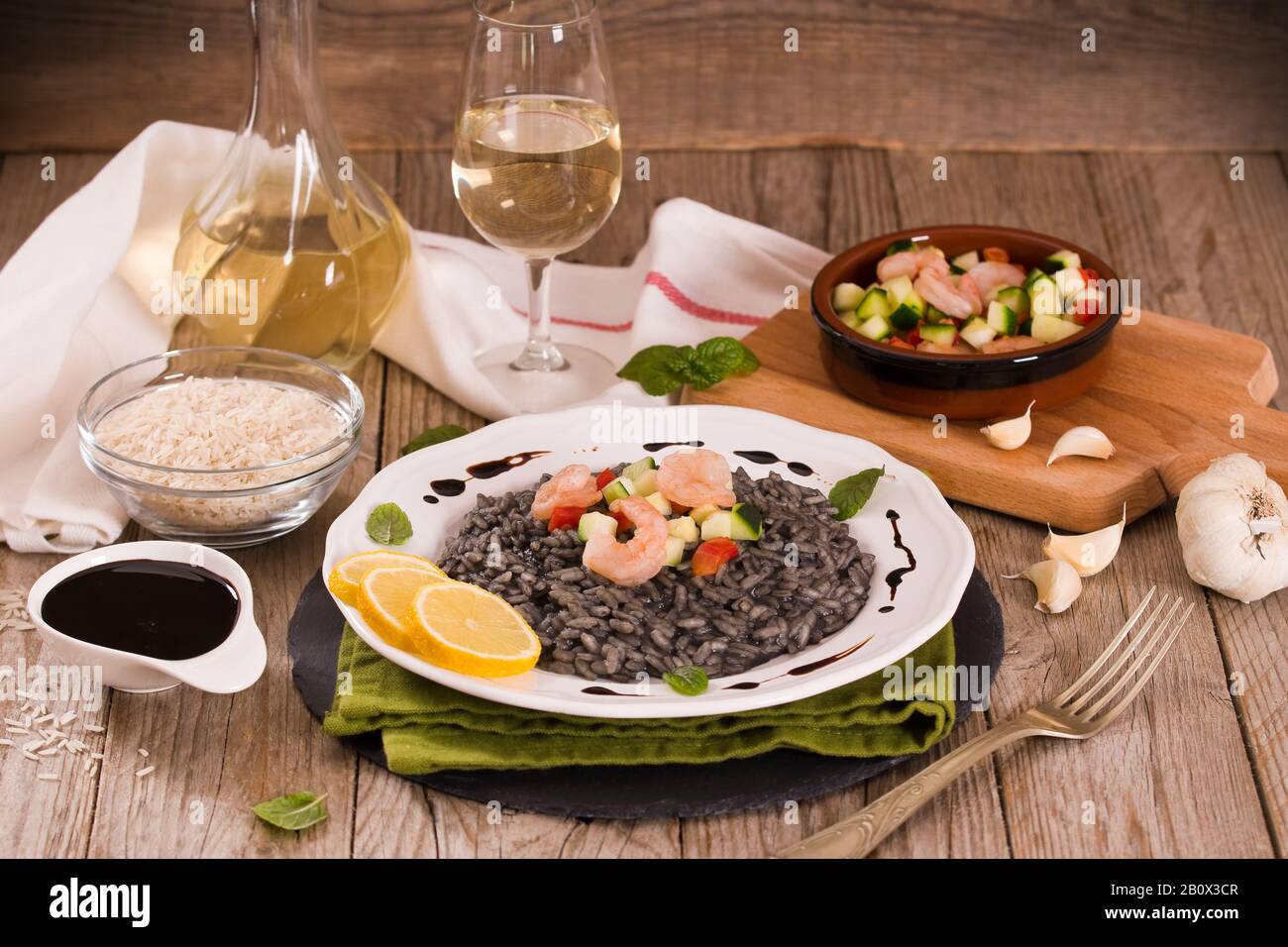 Squid ink risotto Stock Photo - Alamy