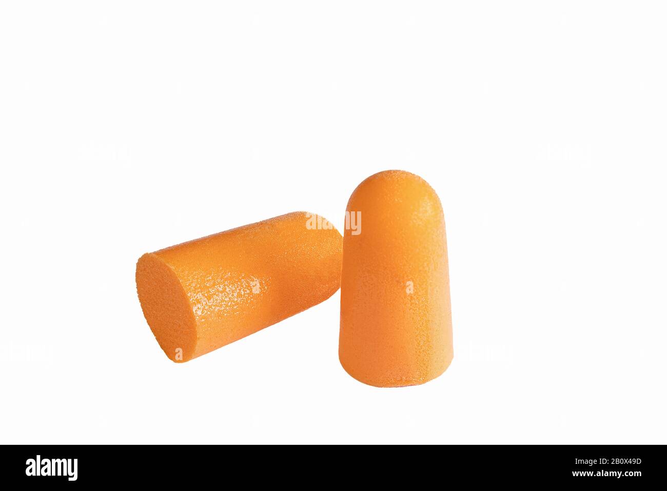 Orange color ear plugs isolated on white background Stock Photo
