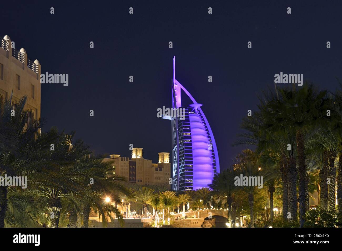 Burj al Arab, illuminated, Souk Madinat, Jumeirah, Emirate of Dubai, United Arab Emirates, Arabian Peninsula, Middle East Stock Photo