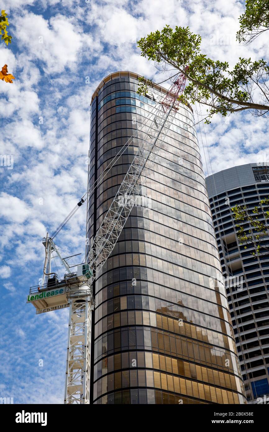 Sydney office skyscraper at EY offices 200 george street in Sydney city centre with adjacent lend lease crane,Sydney,Australia Stock Photo