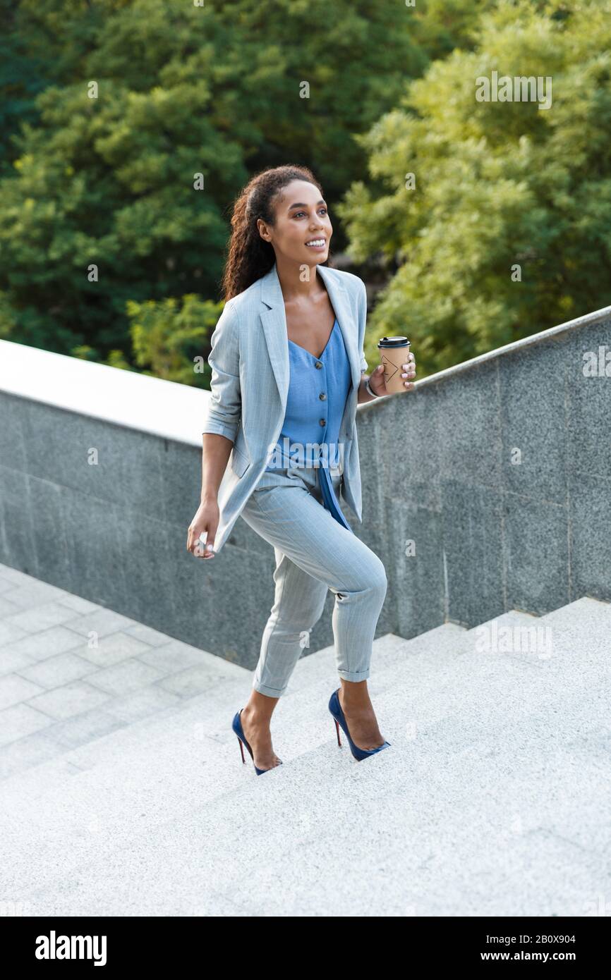 Girl walking up stairs outside hi-res stock photography and images - Alamy