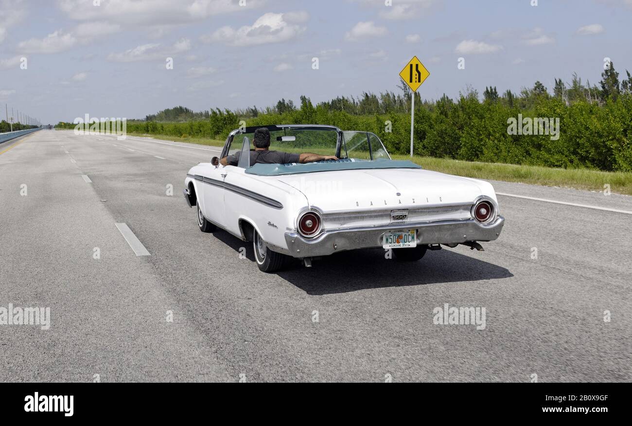 Vintage convertible Ford Galaxie Sunliner 500 on the Florida Scenic Highway, North 1, Key Largo, Florida Keys, Florida, USA, Stock Photo