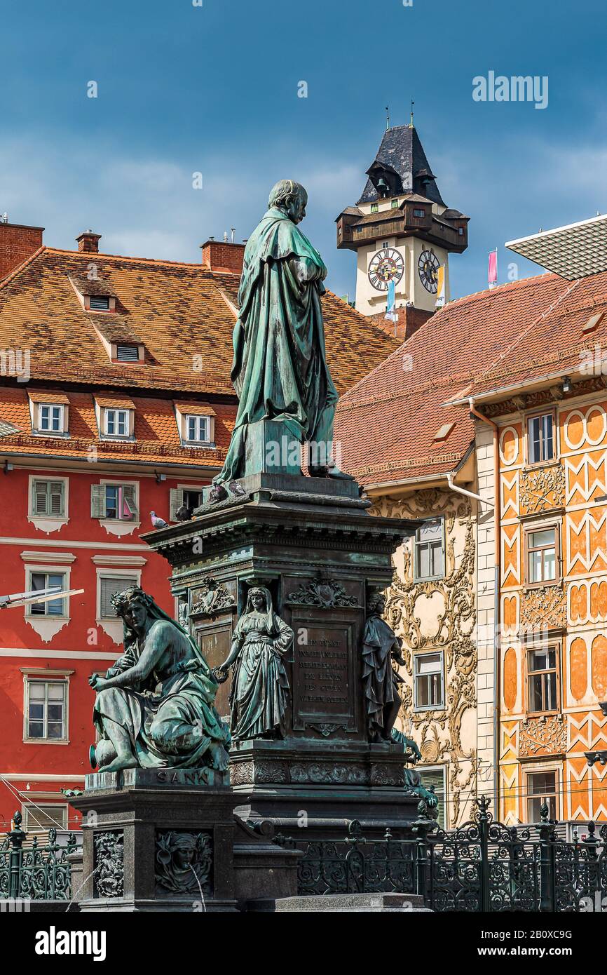 Statue in the middle of the Main Square of Graz and the Uhrturm Stock ...