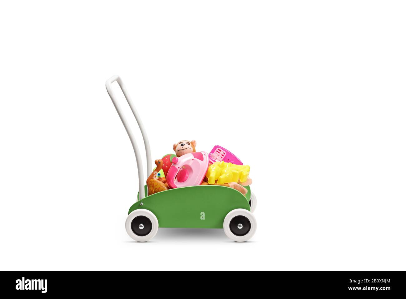 Little green wooden cart with toys isolated on white background Stock Photo