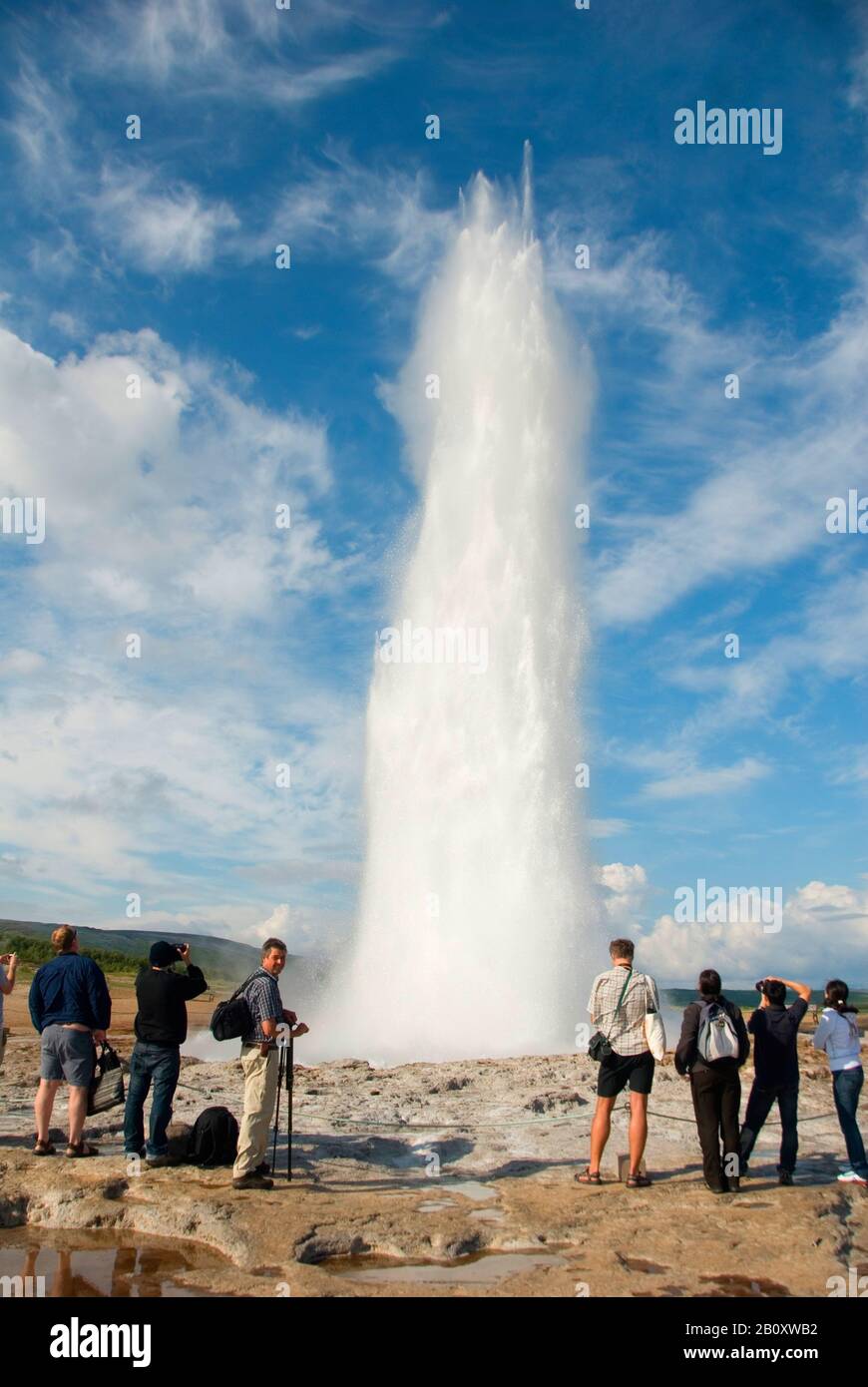 tourists near Strokkur geyser, Iceland, Haukadakur Stock Photo