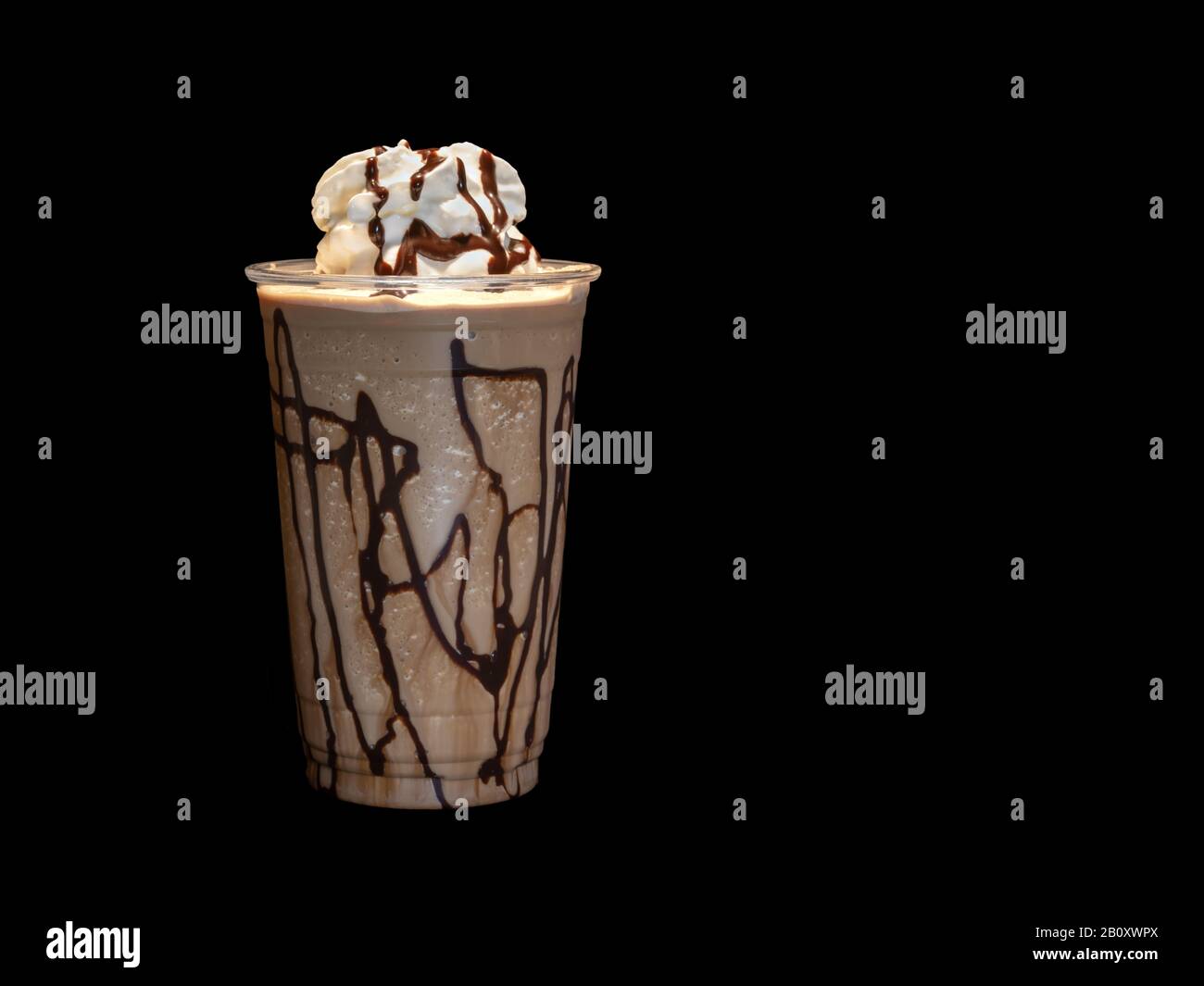 Blended chocolate mocha coffee frappe drink with whipped cream Stock