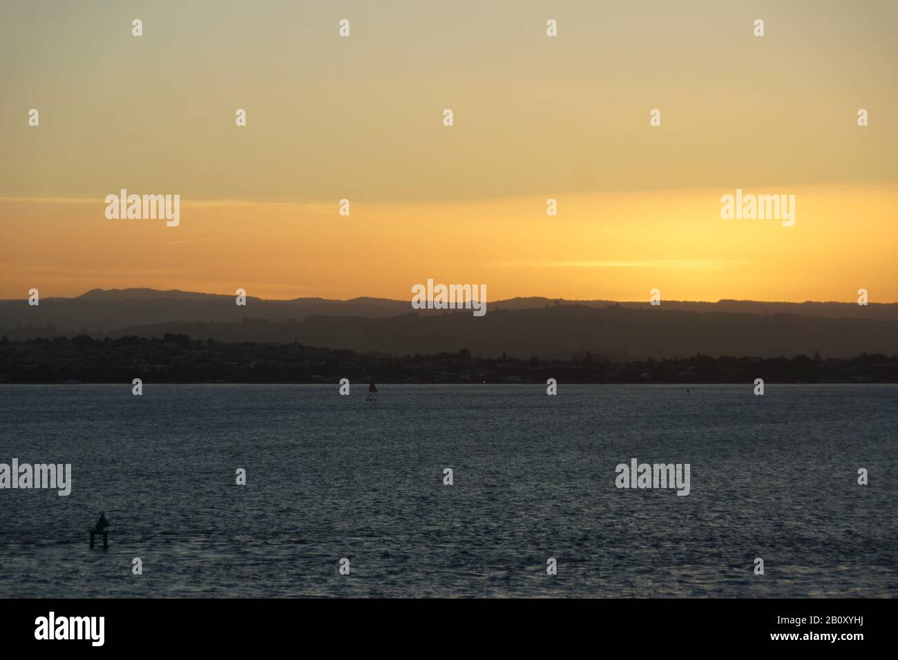 Golden sunset in the Bay of Islands Stock Photo