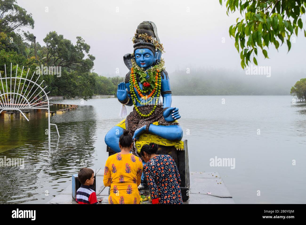 Faith through Generations : Took this picture whilst visiting one of the biggest Hindu Temples in Mauritius. Stock Photo