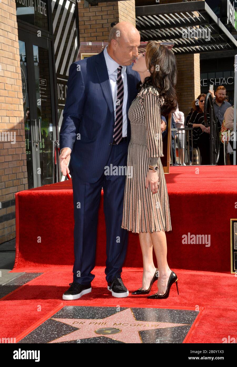 Los Angeles, USA. 21st Feb, 2020. LOS ANGELES, CA. February 21, 2020: Dr. Phil McGraw & Robin McGraw at the Hollywood Walk of Fame Star Ceremony honoring Dr Phil McGraw. Pictures Credit: Paul Smith/Alamy Live News Stock Photo