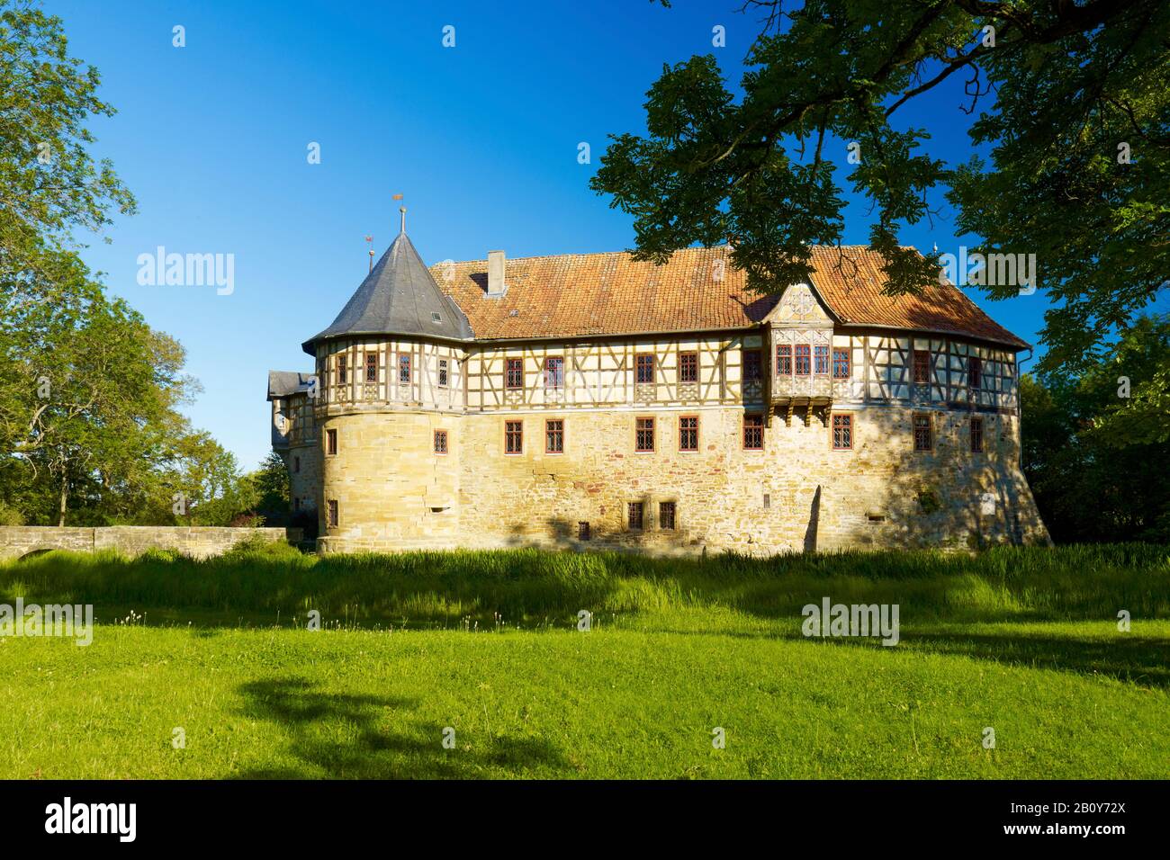 Irmelshausen moated castle, Rhön-Grabfeld, Lower Franconia, Bavaria, Germany, Stock Photo