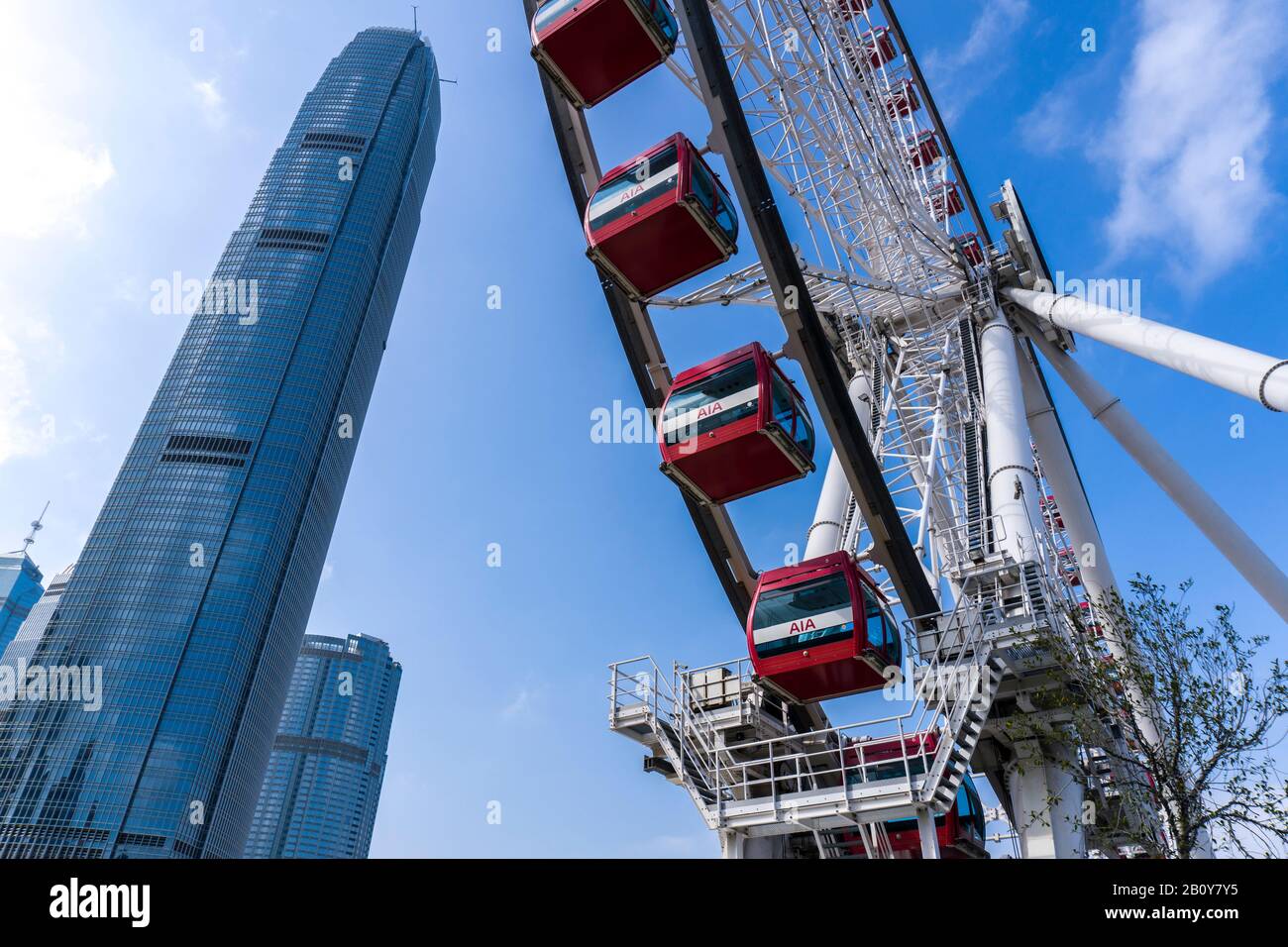 Hong Kong - January 18 2020 : The Hong Kong Observation Wheel and International Finance Center in Central, Close Up, Dutch Angle View Stock Photo