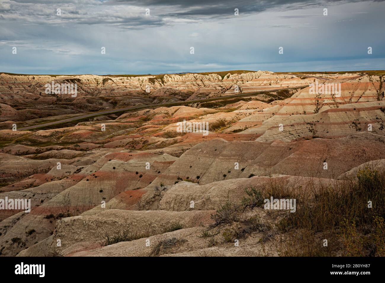 SD00186-00...SOUTH DAKOTA - View of layered buttes and the Badlands Loop Road from Big Foot Pass Overlook in Badlands National Park. Stock Photo