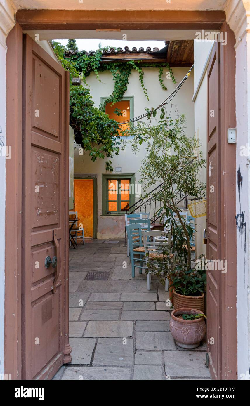 Doorway to hidden artFix theatre cafe courtyard in Athens, Greece Stock Photo